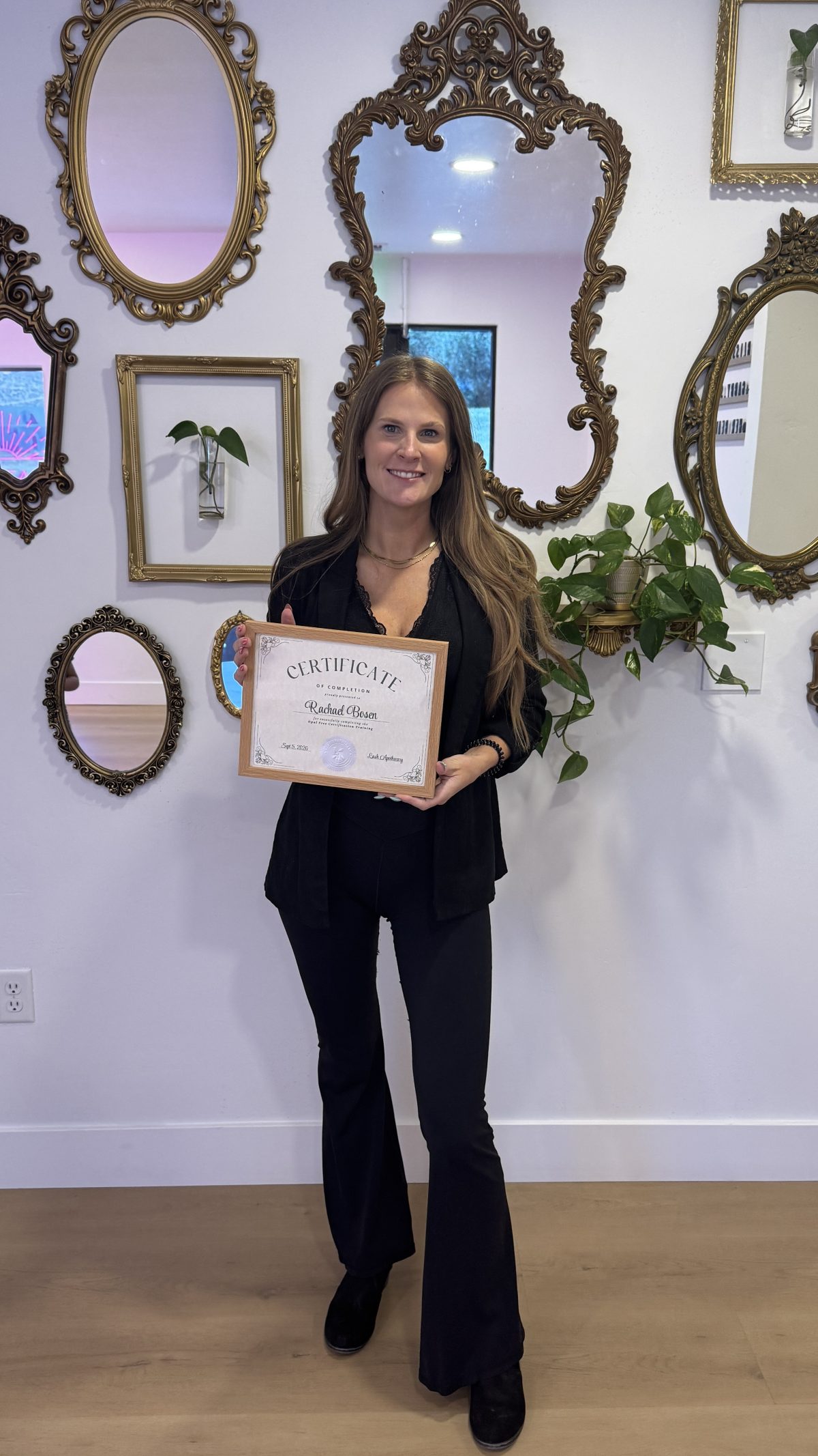 Rachael Bosen holding her Opal Free certificate